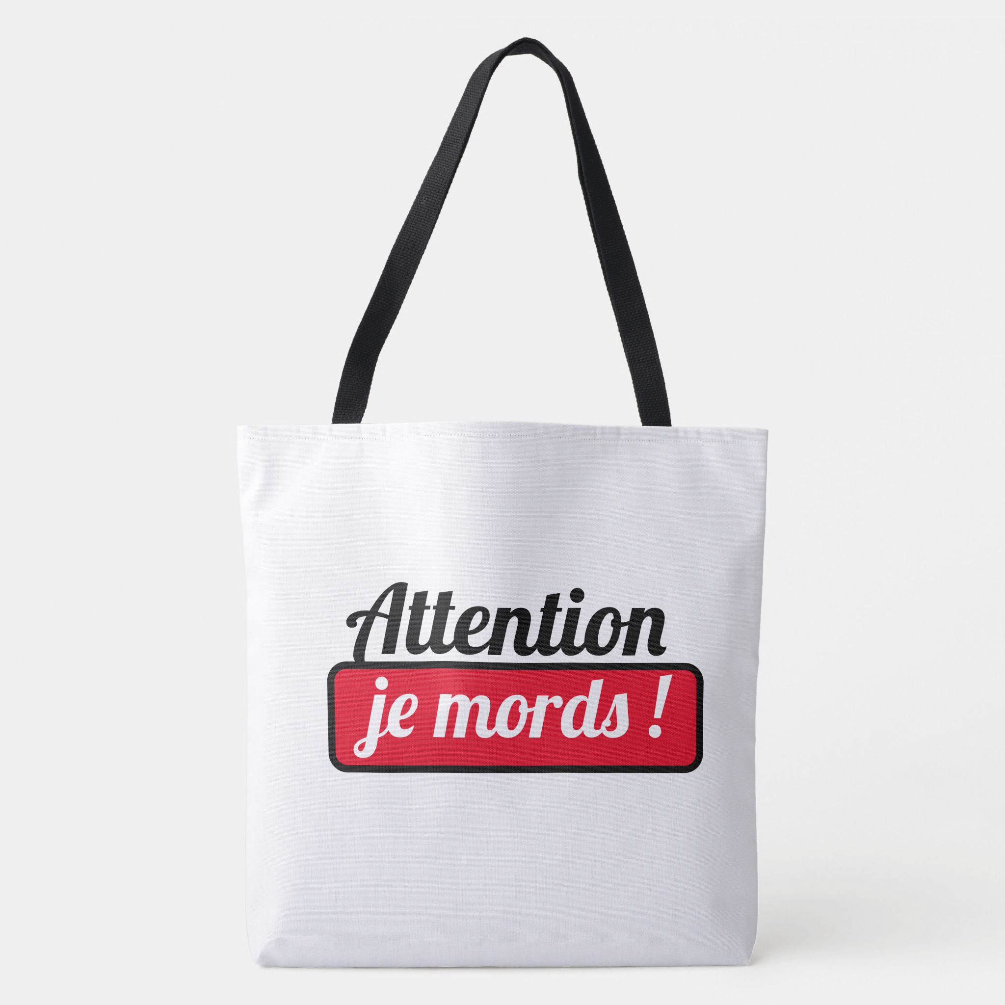 Attention je mords !
